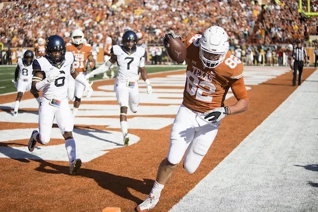 Texas Rolls Over West Virginia, 33-16